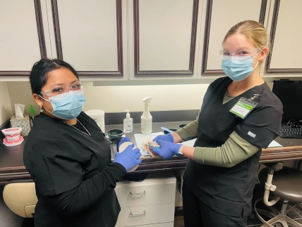 Dental assistant professional in clinical setting